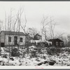 Mrs. Brown's shack and that of another shipyard worker's family. Both have been built recently about five miles out of Bath, Maine. See caption #42624-D.