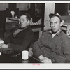 Two shipyard workers in for a cup of coffee after work at the Bath Iron Works. Left is Paul Jacobs and Ronnie Williams. Both live about eighteen miles outside of Bath, Maine.