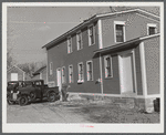 Removing corn cobs at Kenyon's johnnycake flour mill in Usquepaugh, Rhode Island.