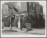Christmas trees for sale at a gas station. Woonsocket, Rhode Island.