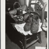 Shoes and lunch taken by Mr. Fairchild to work at a steel works in Boston, Massachusetts. He is a vegetable farmer near Saugus, Massachusetts.