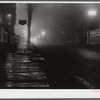 Street in New Bedford at night during a fog. New Bedford, Massachusetts.