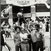 Youth outside entrance to Dance Theatre of Harlem during a street fair