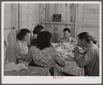 Dinner time at the family of Levy Usher at Hazlehurst Farms. Hazlehurst, Georgia.