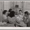 Dinner time at the family of Levy Usher at Hazlehurst Farms. Hazlehurst, Georgia.