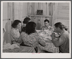 Dinner time at the family of Levy Usher at Hazlehurst Farms. Hazlehurst, Georgia.
