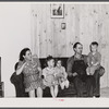 Mr. Paul Hatchet and his family. Have just moved into a prefabricated house from the Camp Croft area. Pacolet, South Carolina.