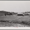 This road is the Camp Croft boundary. The family who lived in the house at the left is moving into the barn on the right.