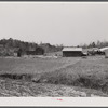 This road is the Camp Croft boundary. The family who lived in the house at the left is moving into the barn on the right.