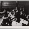 School teachers in Centralhatchee, Georgia, have organized movies in the school auditorium for those who can't get to town. Heard County, Georgia.