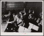 School teachers in Centralhatchee, Georgia, have organized movies in the school auditorium for those who can't get to town. Heard County, Georgia.