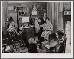 Mr. and Mrs. L. Smith and their younger children in their home in Carroll County, Georgia (see general caption).
