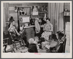 Mr. and Mrs. L. Smith and their younger children in their home in Carroll County, Georgia (see general caption).