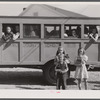 Schoolchildren and bus. Franklin, Heard County, Georgia.
