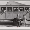 Schoolchildren and bus. Franklin, Heard County, Georgia.