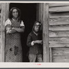 This [Black] woman lives with her husband and two grandchildren in an old converted schoolhouse. All the rest of her children have left the county. Heard County, Georgia.