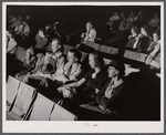 School teachers in Centralhatchee, Georgia have organized movies in the school auditorium for those who can't get to town. Heard County, Georgia.