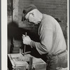 Moulder at work in Correct Manufacturing Company. Fallston, Pennsylvania.
