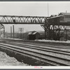 The end of the afternoon shift at the Jones and Laighlin Steel Corporation. Aliquippa, Pennsylvania.