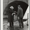 Union member distributing "Steel Labor" near the entrance to the Jones and Laughlin Steel Corporation in Aliquippa Pennsylvania.