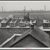 Houses and steel mill in Aliquippa, Pennsylvania.