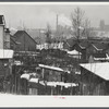Backyards in Aliquippa, Pennsylvania and the Jones and Laughlin Steel Corporation in the background.