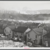 Houses and Pittsburgh Crucible Steel Company in Midland, Pennsylvania.