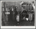 Oil cans and soldering equipment in barn on farm near Rockville, Maryland.