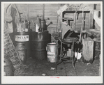 Oil cans and soldering equipment in barn on farm near Rockville, Maryland.