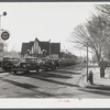 Traffic on the main highway from Fort Bragg, North Carolina to Fayetteville, at the time when the workers are coming out of fort. North Carolina.