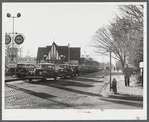 Traffic on the main highway from Fort Bragg, North Carolina to Fayetteville, at the time when the workers are coming out of fort. North Carolina.