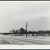View of a settlement of shacks and trailers occupied by workers from Fort Bragg. Along Fayetteville--Fort Bragg road. North Carolina.