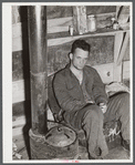 This truck driver from Fort Bragg lives with three others in a little shack near Fayetteville, North Carolina. They come from Selma, North Carolina. All expect to be laid off next payday.