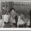 In the second story of tobacco barn used as living quarters by family of workers from Fort Bragg, North Carolina, near Fayetteville, North Carolina.