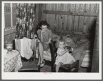 In the second story of tobacco barn used as living quarters by family of workers from Fort Bragg, North Carolina, near Fayetteville, North Carolina.