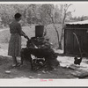 Mrs. L. Smith making her own soap on their farm in Carroll County, Georgia.