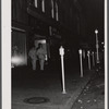 Soldiers from Fort Benning on the main street of Columbus, Georgia, at night.