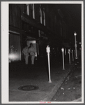 Soldiers from Fort Benning on the main street of Columbus, Georgia, at night.