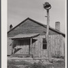 Tenant house and plantation bell. Heard County, Georgia.