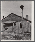 Tenant house and plantation bell. Heard County, Georgia.