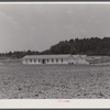 Bunkhouses being built by a farmer in expectation of the increase in employment at the nearby powder plant. Childersburg, Alabama.