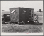 Mrs. David Gurly Tull, her son, and husband came from Arkansas looking for work at the new powder plant near Childersburg. Mr. Tull couldn't get a job at the powder plant but found temporary employment building bunkhouses. Childersburg, Alabama.