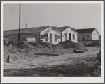 New cafes and bunkhouses amid the laying of a new sewer. Childersburg, Alabama.
