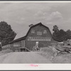 A dairy barn at Kymulga (about six miles from Childersburg, Alabama) converted into a three-story bunk house to accomodate workers as a result of the expected increase in employment at the nearby powder plant.