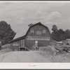 A dairy barn at Kymulga (about six miles from Childersburg, Alabama) converted into a three-story bunk house to accomodate workers as a result of the expected increase in employment at the nearby powder plant.