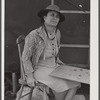 Mrs. David Gurly Tull, her son, and husband came from Arkansas looking for work at the new powder plant near Childersburg. Mr. Tull couldn't get a job at the powder plant but found temporary employment building bunkhouses. Childersburg, Alabama.
