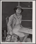 Mrs. David Gurly Tull, her son, and husband came from Arkansas looking for work at the new powder plant near Childersburg. Mr. Tull couldn't get a job at the powder plant but found temporary employment building bunkhouses. Childersburg, Alabama.