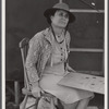 Mrs. David Gurly Tull, her son, and husband came from Arkansas looking for work at the new powder plant near Childersburg. Mr. Tull couldn't get a job at the powder plant but found temporary employment building bunkhouses. Childersburg, Alabama.