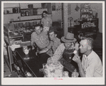 Workmen from the nearby powder plant in a cafe in Childersburg, Alabama.