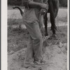 Feet of a Negro farmer. Greene County, Georgia.